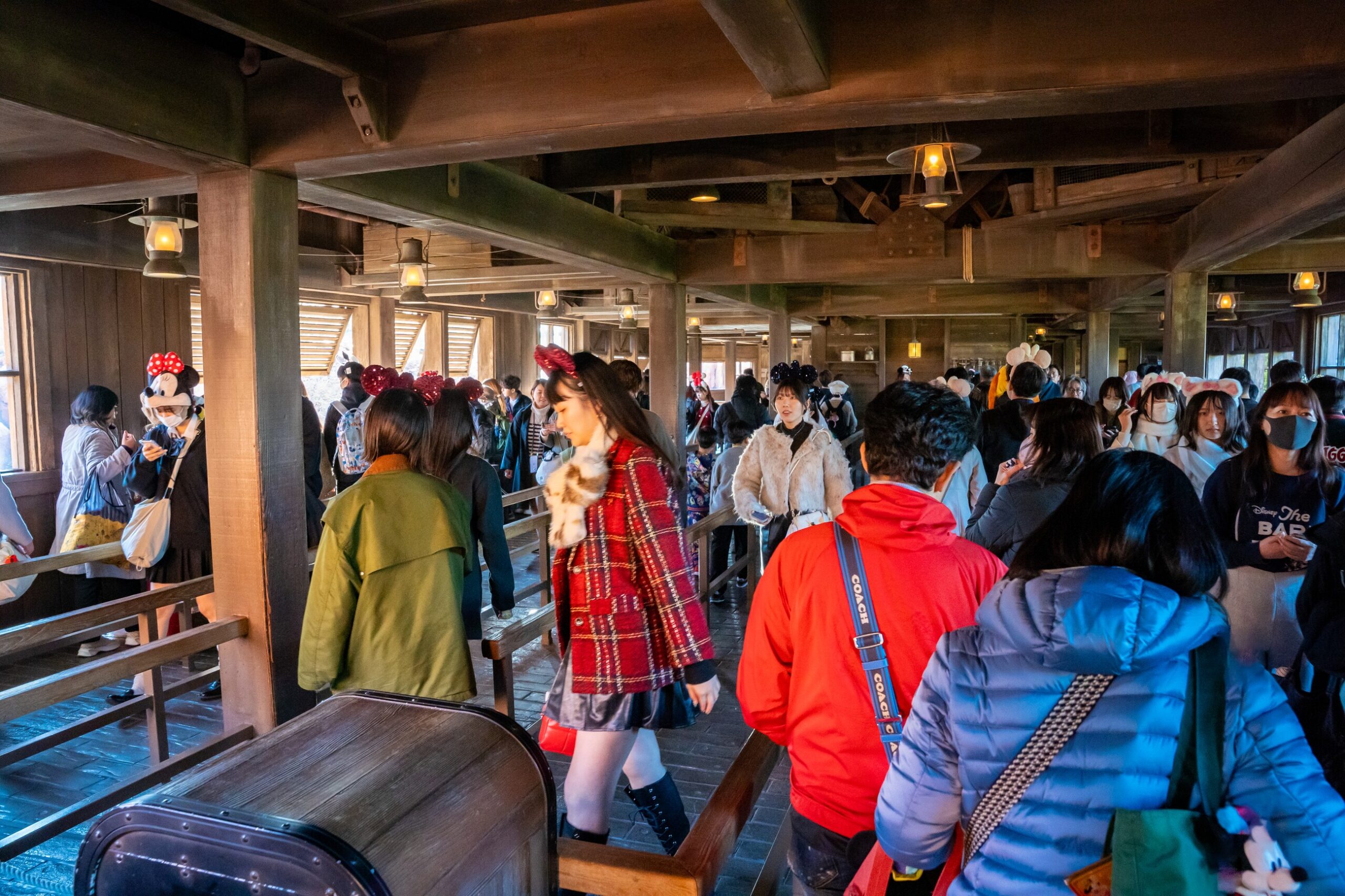 Guests waiting inside the timber queue at Big Thunder Mountain