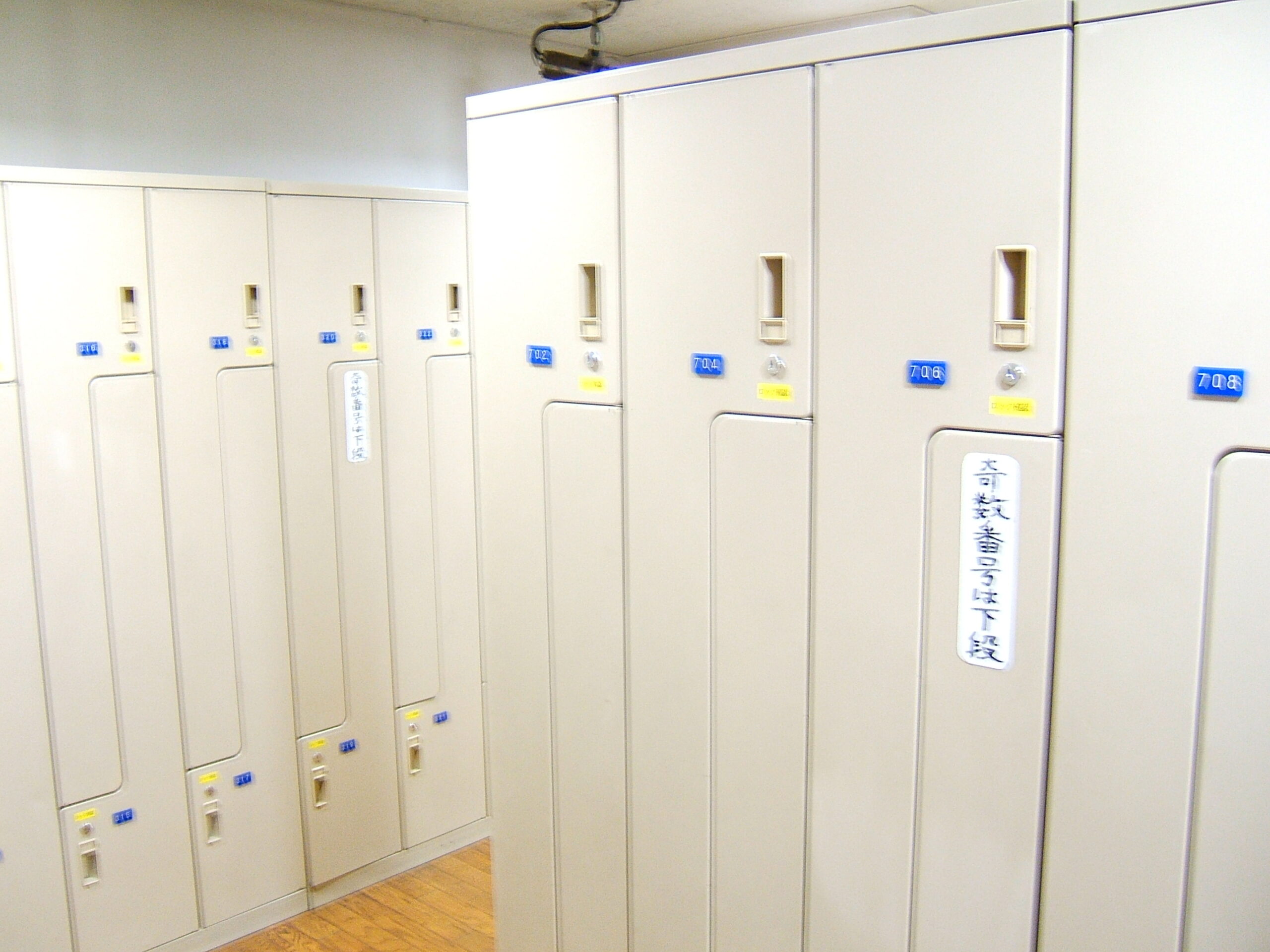 Tall guest lockers inside a capsule hotel in Akihabara