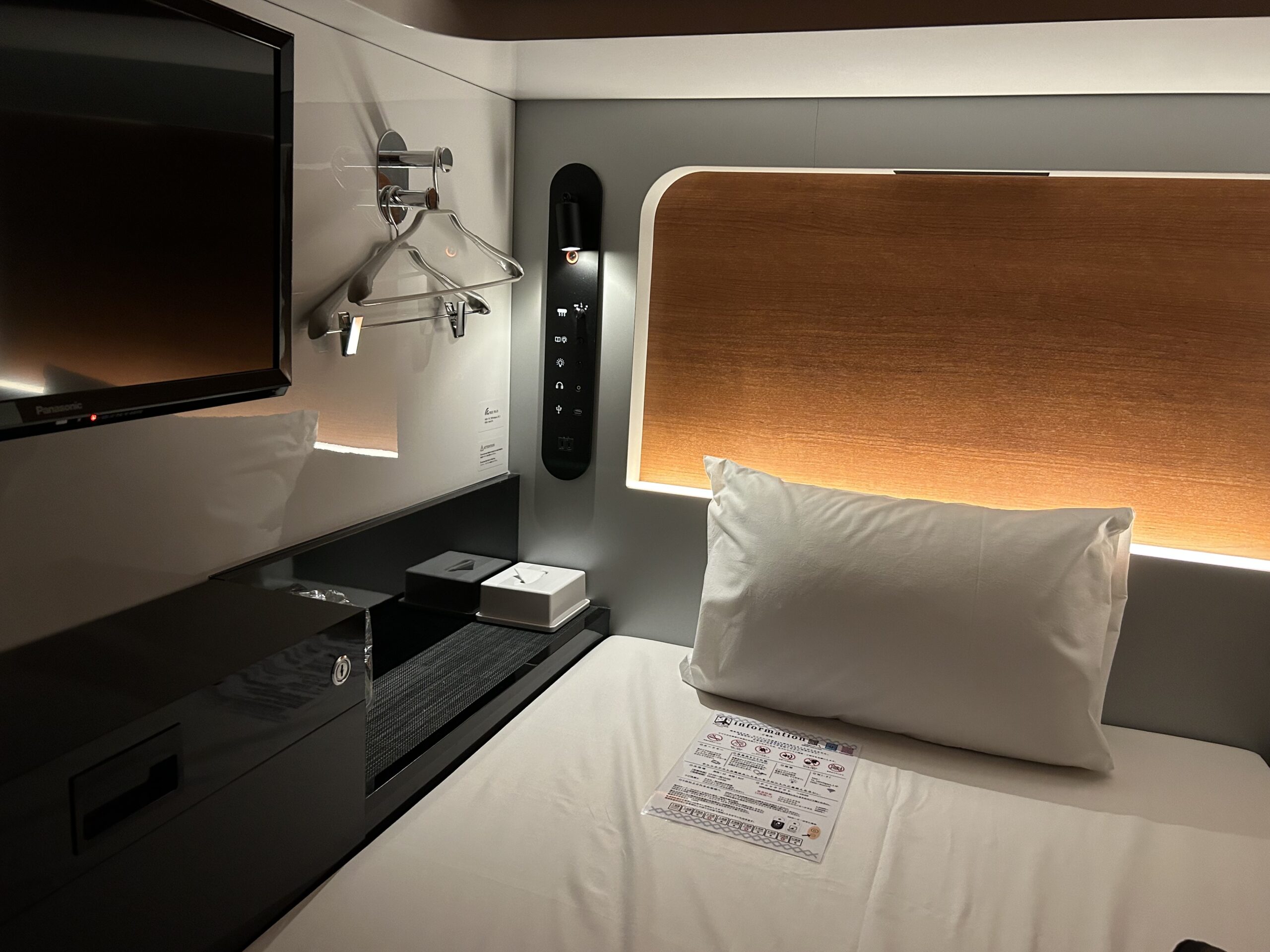 Wide cabin-style sleeping space at a capsule hotel in Tokyo