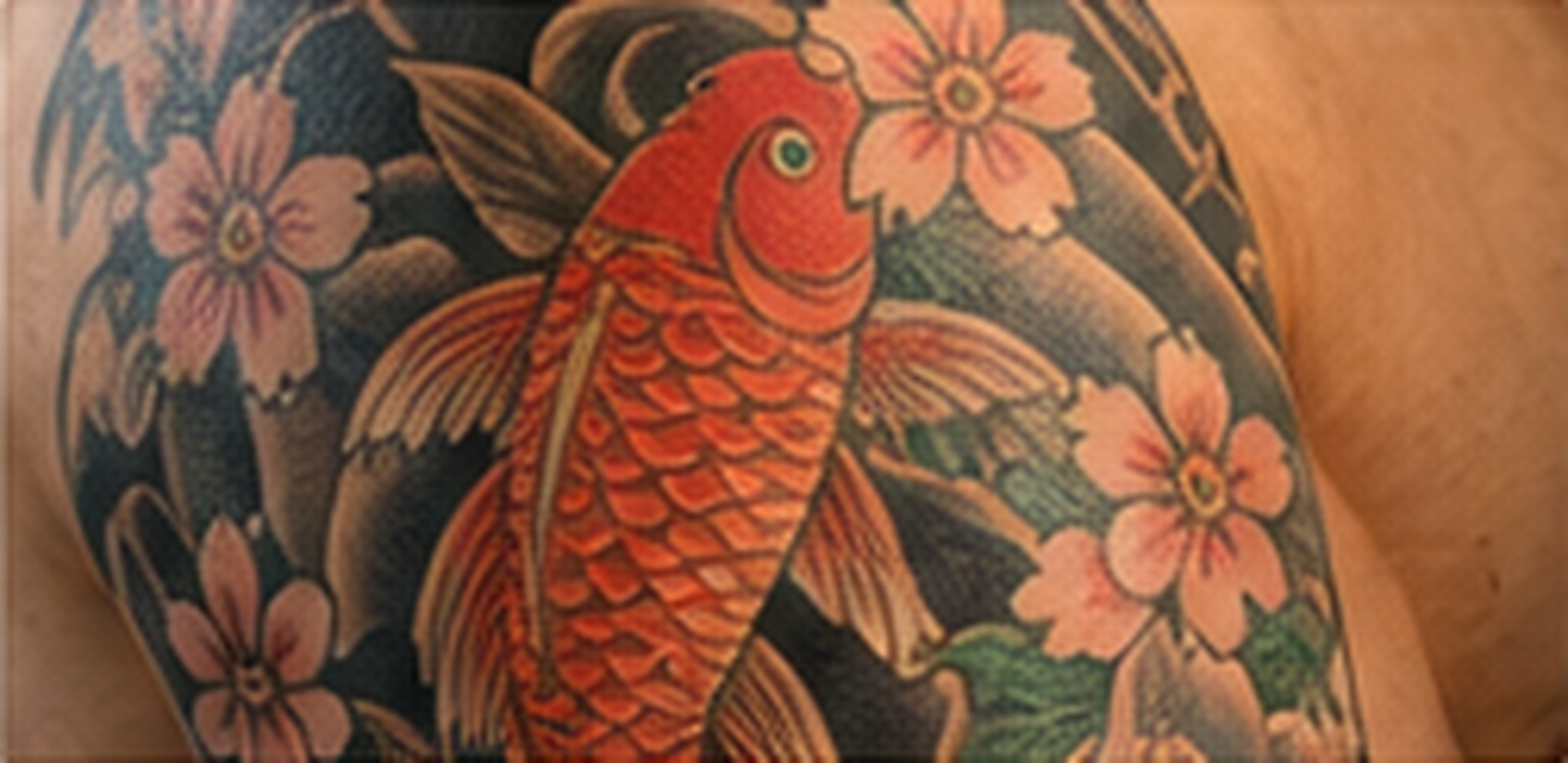 Close view of a traveler’s tattoo