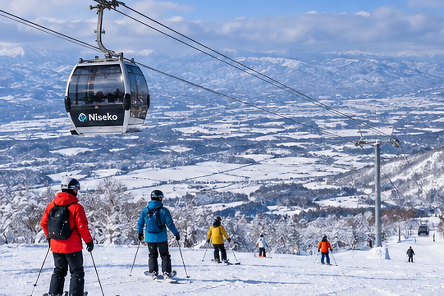 Skiers on a snowy mountain slope in Japan